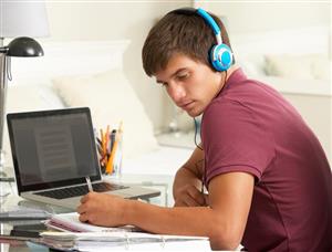 student studying with music 